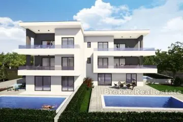 Apartment under construction with swimming pool