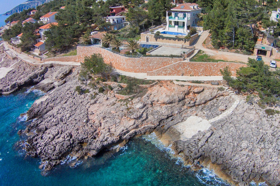 Beautiful villa at first row the sea sea