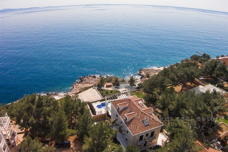 Beautiful villa at first row the sea sea