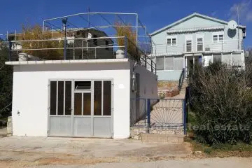 House in first row to the sea