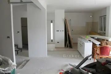 Unfinished three-bedrooms apartment