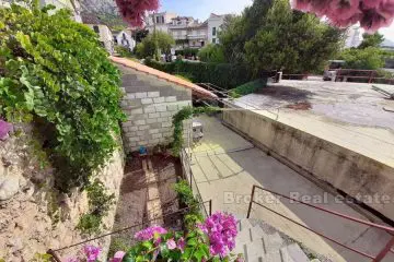 Two-storey apartment with private garden