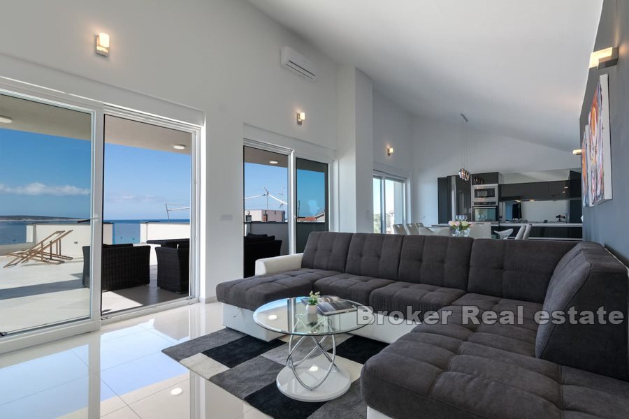 Penthouse located in first row by the sea