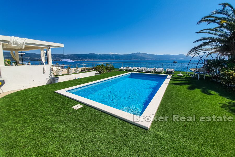 Villa on the beach with spacious terraces and sea view