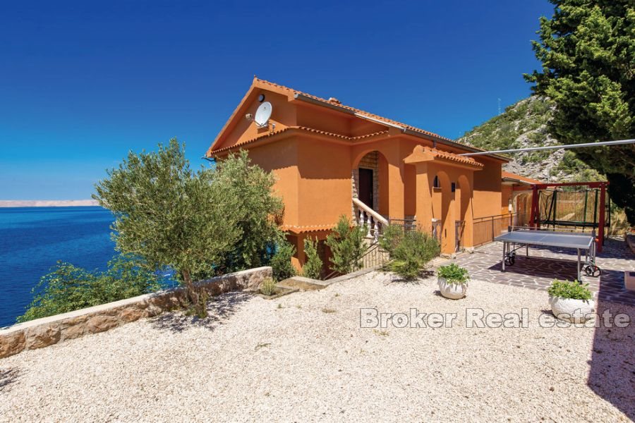 House on the sea with private access to the beach with a boat dock