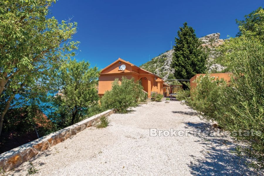 House on the sea with private access to the beach with a boat dock