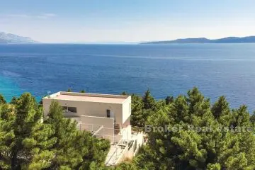 Newly built villa first row to the sea