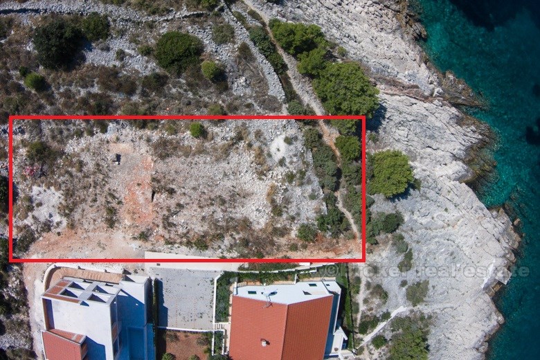 Building land plot at first row to the sea