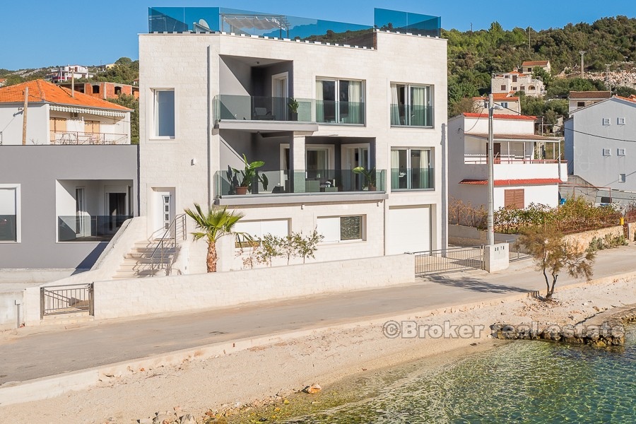 Elegant, new built villa, at first row to the sea