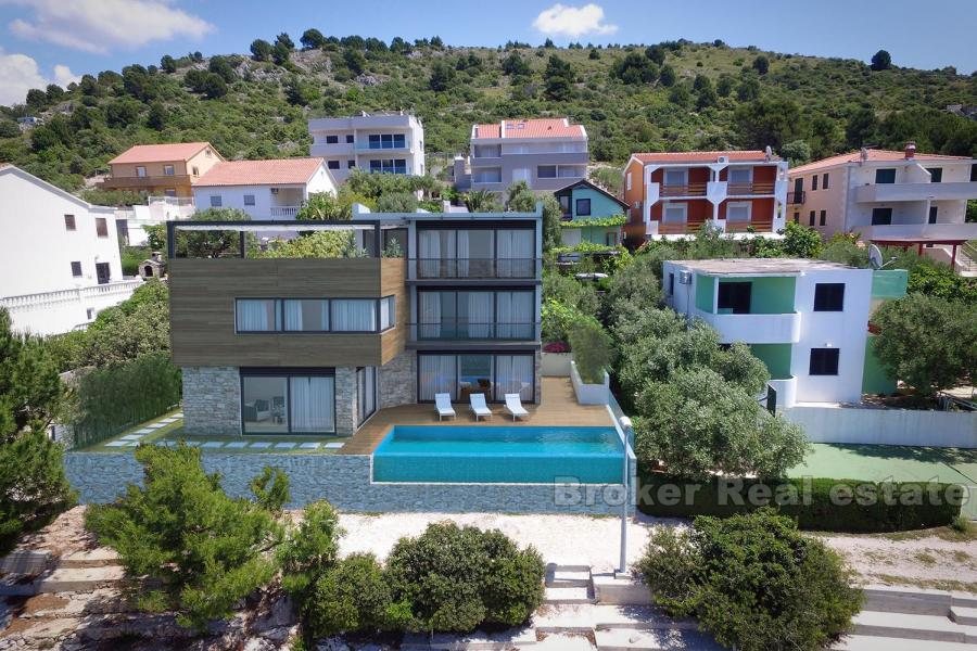 Modern villa first row to the sea, for sale