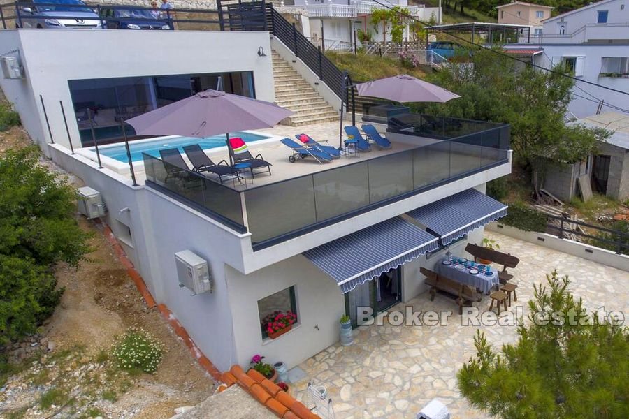 Modern villa with pool and panoramic sea view