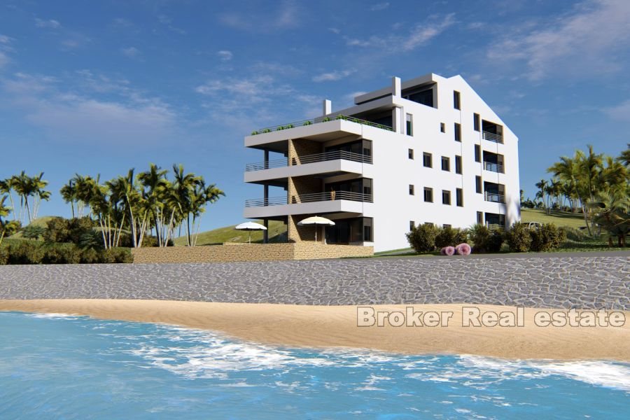 Villa with luxury apartments, first row to the sea