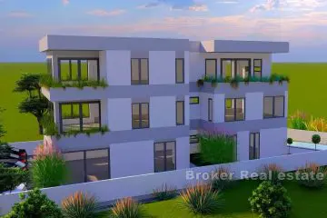Lägenheter i ett nybyggt hyreshus med pool