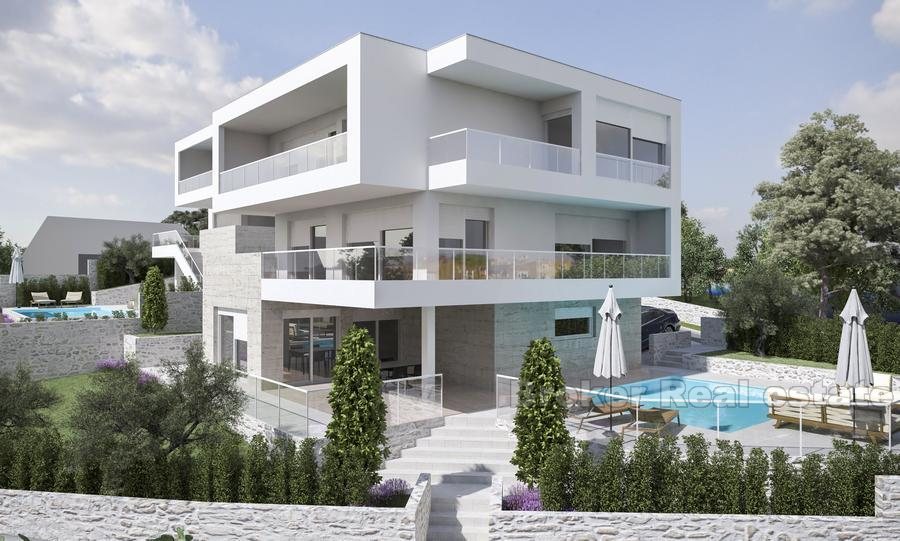 Modern villa with swimming pool in construction