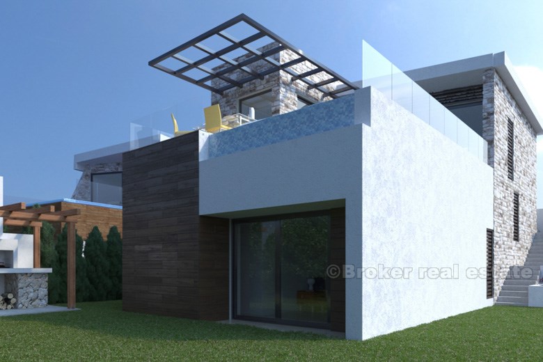 Moderne villa med svømmebasseng og havutsikt til salgs