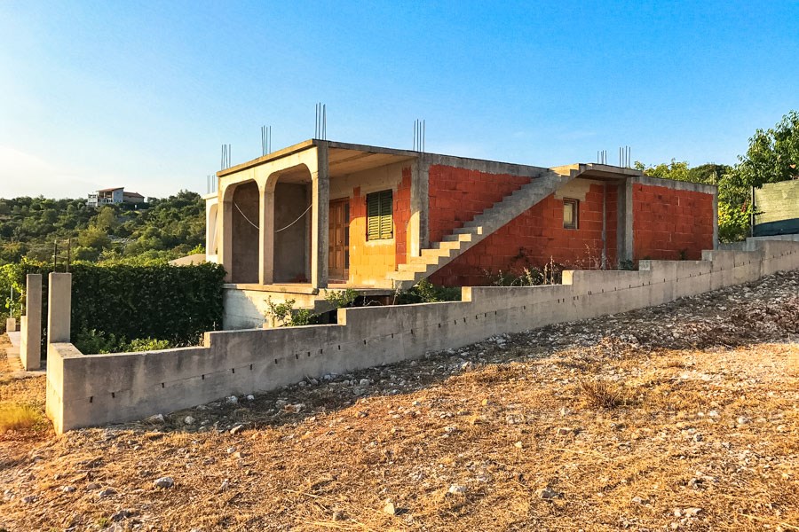 Detached unfinished house for sale