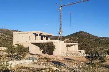 House under construction with a sea view