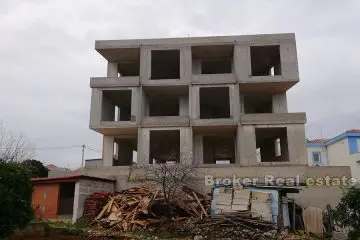 Unfinished building with sea view