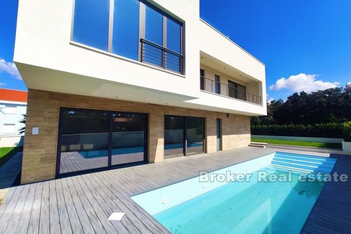 Modern villa with a pool and sea view