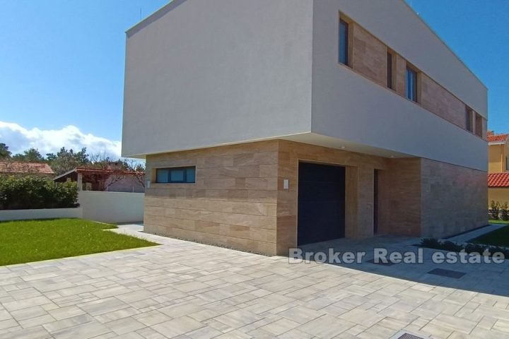 Modern villa with a pool and sea view