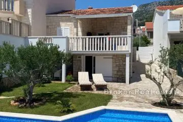 Stone house with pool and sea view
