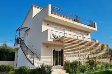 A modern house with a view of the sea