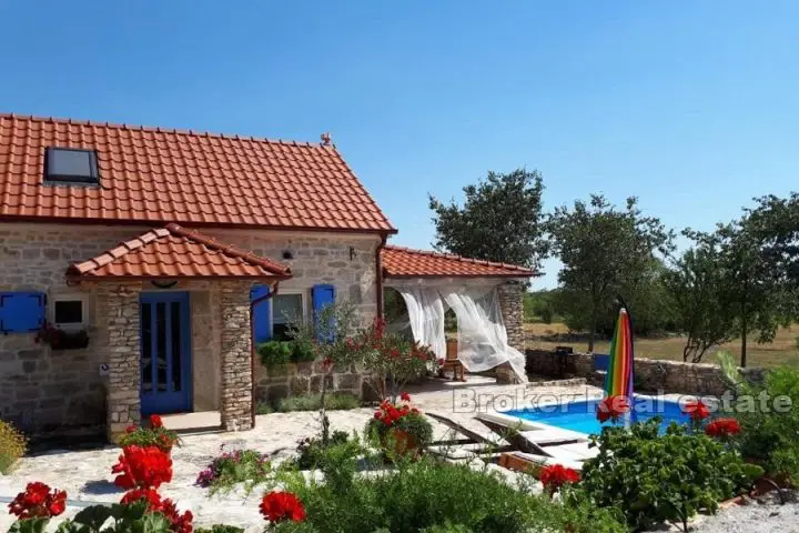 Stone house with pool in a quiet location