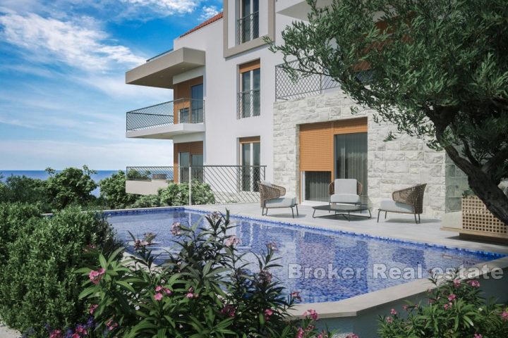 Apartment with pool and open sea view