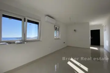 Apartments in a newly completed building with sea view