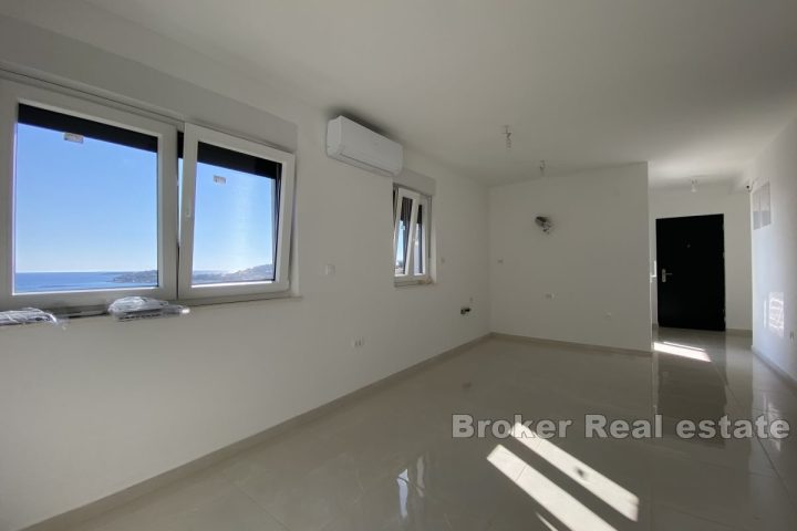 Apartments in a newly completed building with sea view