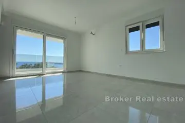 Apartments in a newly completed building with sea view