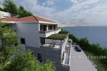 Apartment villa first row to the sea with a pool