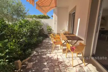 Modern apartment with garden and garage