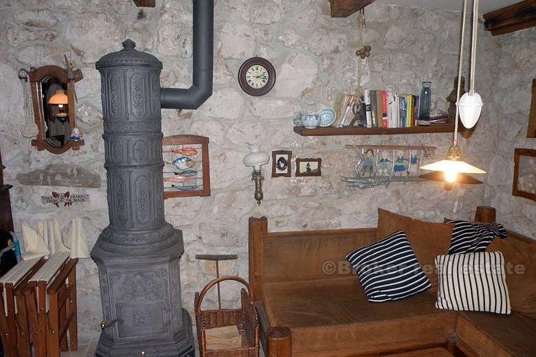 Stone house in the old center of town, for sale