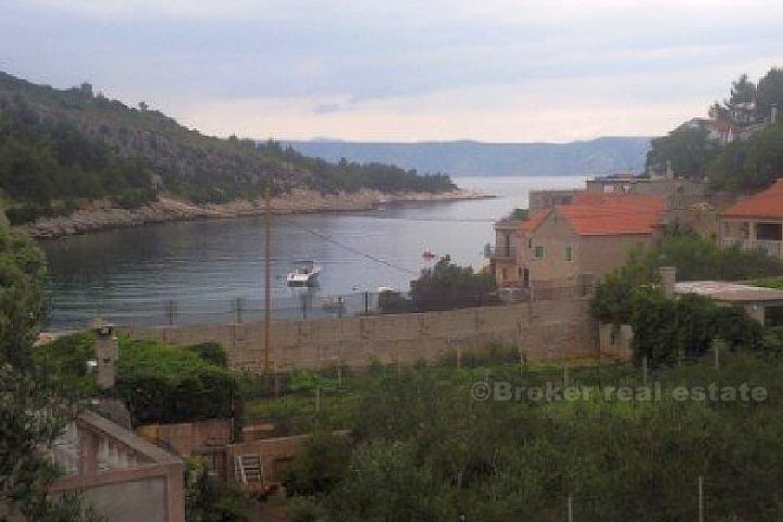 Small house in a quiet bay, for sale