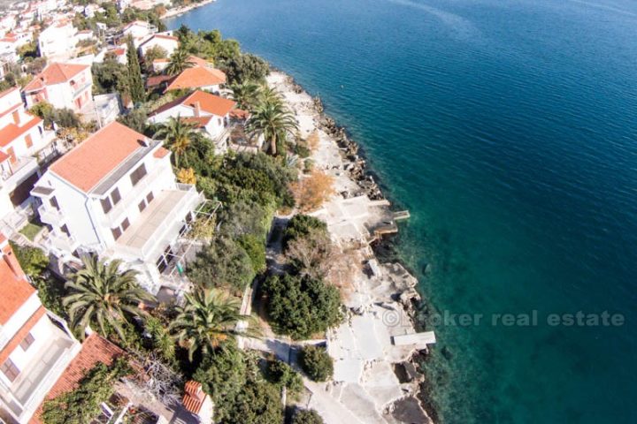 House, first row by the sea, for sale