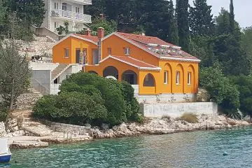 Historical building in a quiet bay, for sale
