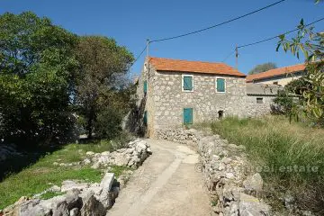 Semi-detached stone house for renovation, for sale