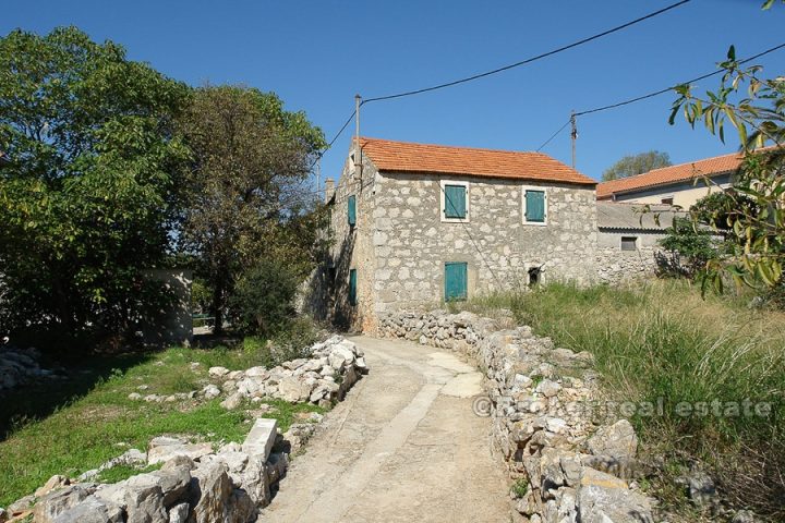 Semi-detached stone house for renovation, for sale