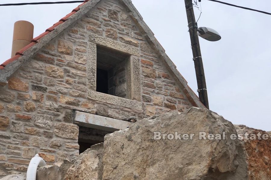 Two stone houses for sale