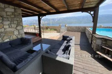 Stone house with pool by the sea