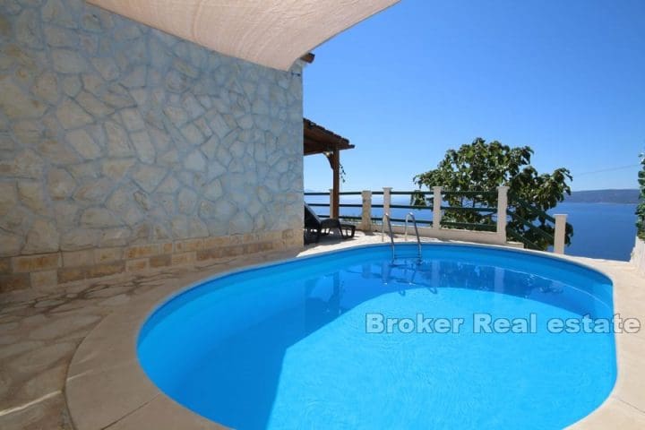 Stone house with pool and open sea view