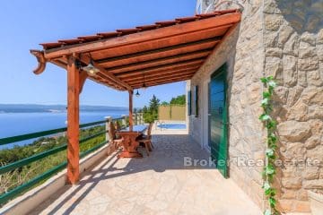 Stone house with pool and open sea view